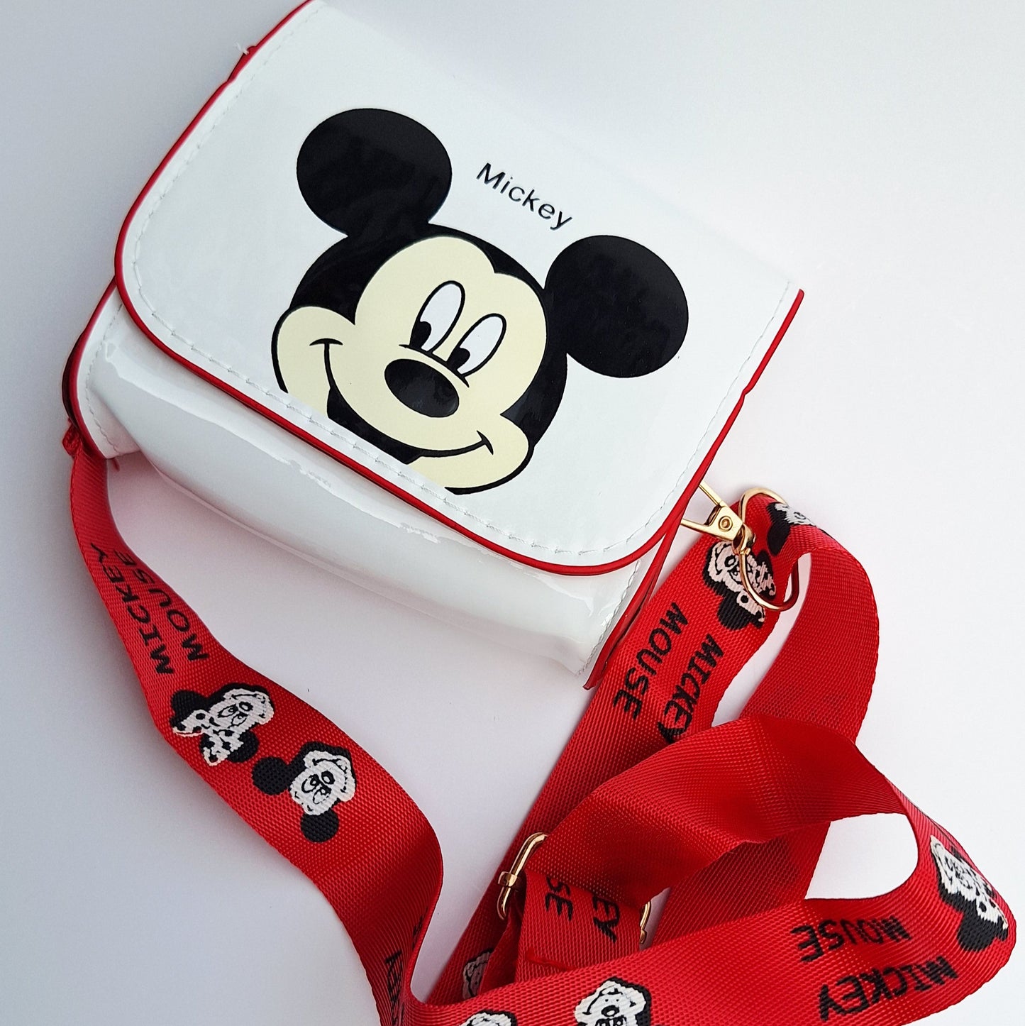 Mini bolso / porta celular Mickey y Minnie Mouse con correa