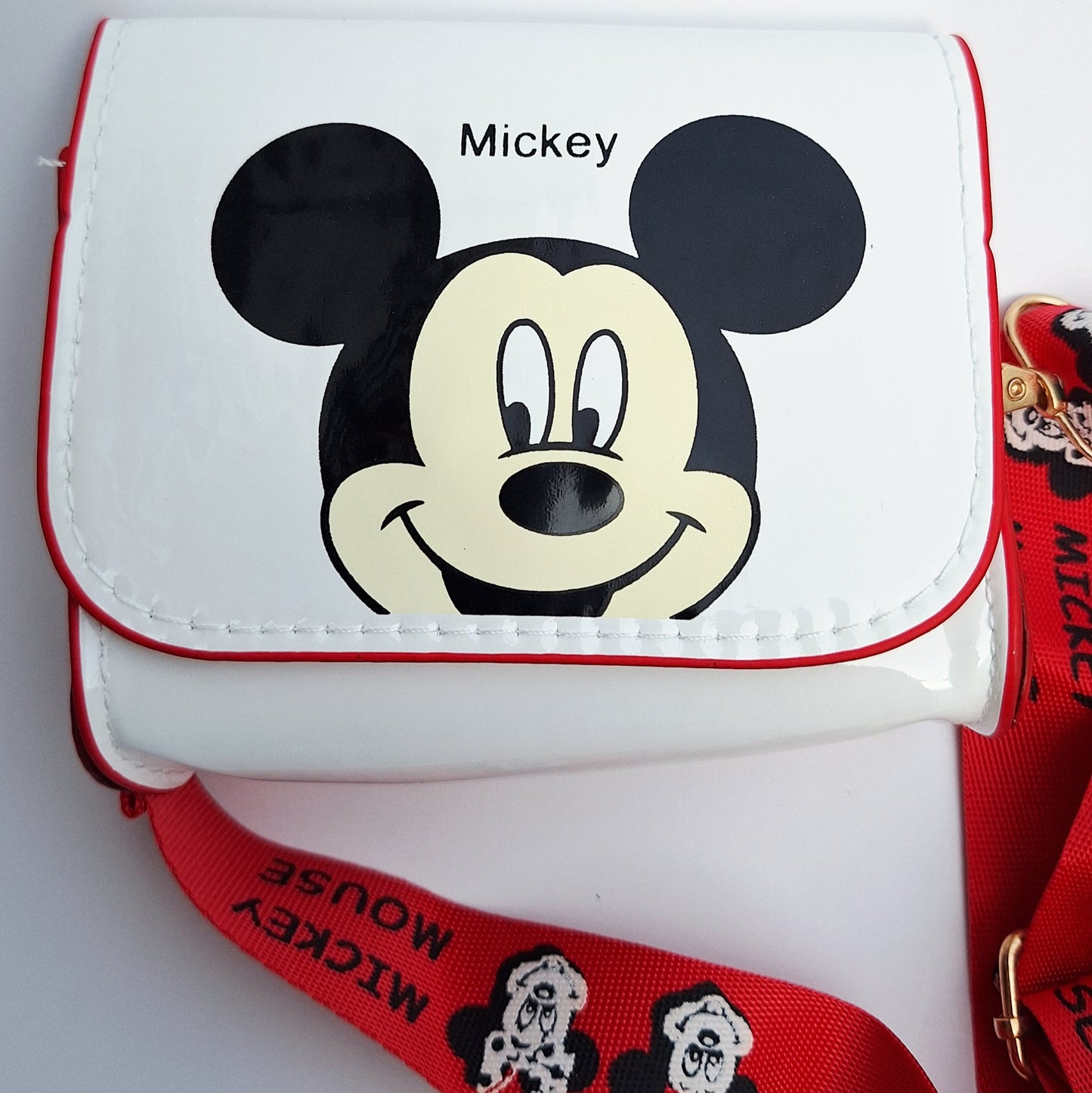 Mini bolso / porta celular Mickey y Minnie Mouse con correa